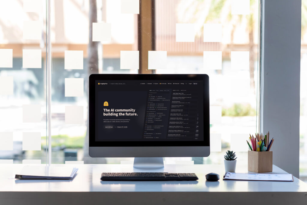 Title image with Hugging Face platform on screen